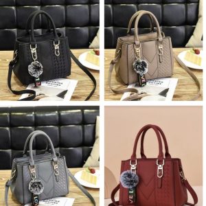Handbag with pom charm